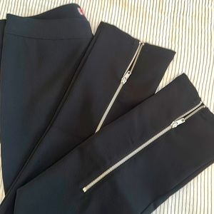 Urban Outfitters black stretch pants with zip hem in back